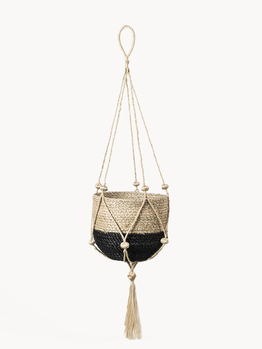 Woven plant hanger with black base and beige top, featuring tassels on a white background.