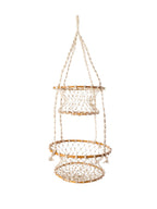 Three-tiered hanging basket with gold trim on a white background