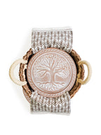 Decorative item with tree of life design on a white background