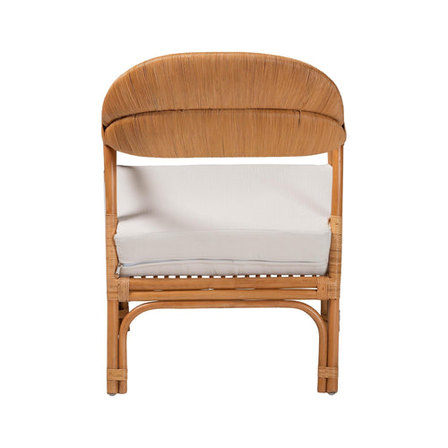 Wicker chair with a white cushion on a white background