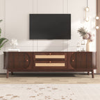 Wooden TV stand with a television mounted on a wall in a modern living room.