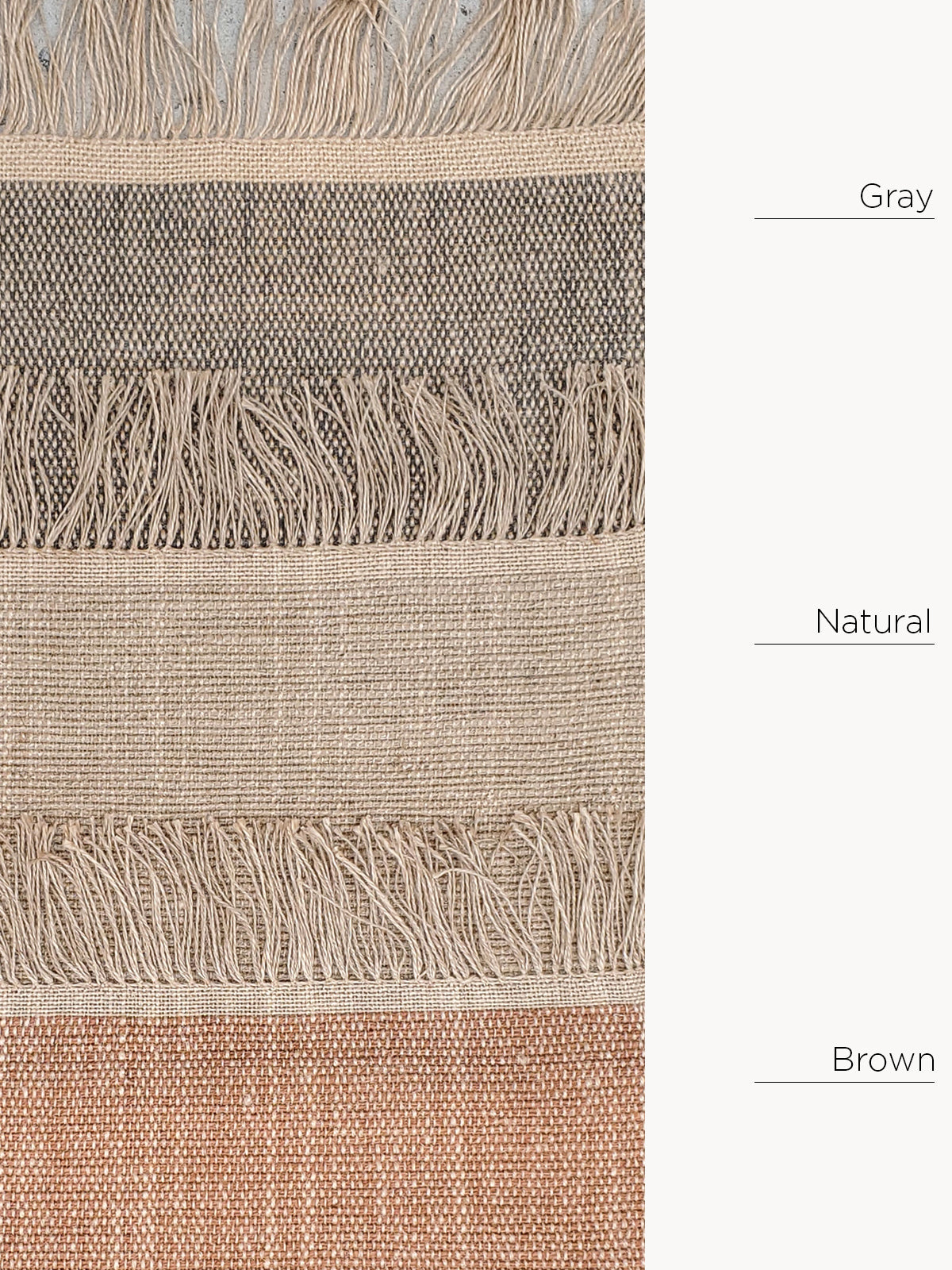 Textured fabric with fringes in gray, natural, and brown colors.