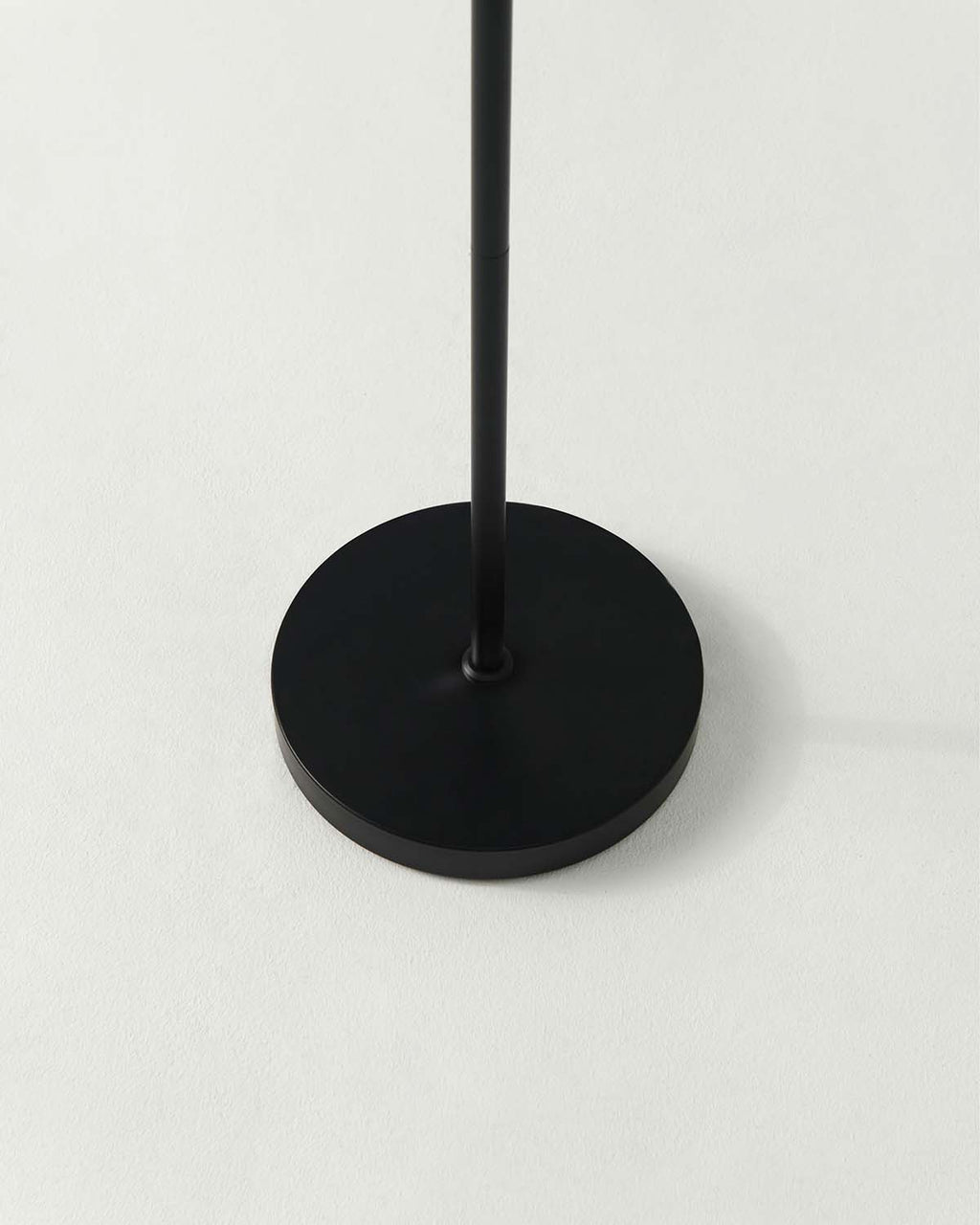 Black stand on a light gray background