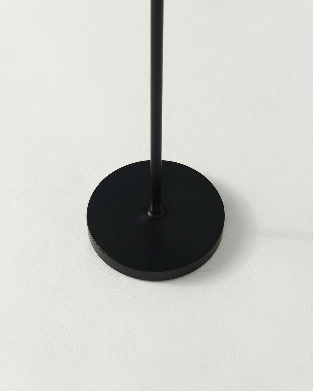 Black stand on a light gray background