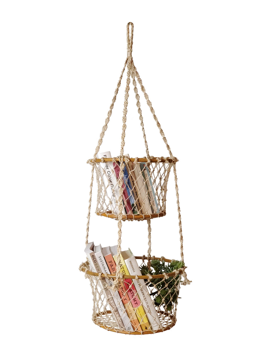 Hanging woven basket with books and plants on a white background