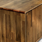 Close-up of a wooden surface with slatted design