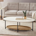 Round coffee table with a wooden tray in front of a beige sofa.