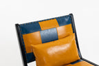 Chair with orange and blue patchwork design on a white background