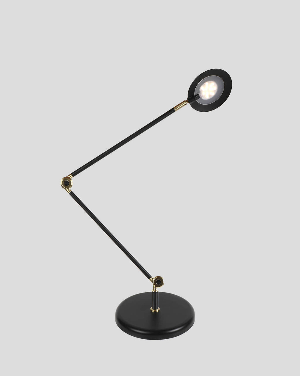 Black adjustable desk lamp on a light gray background
