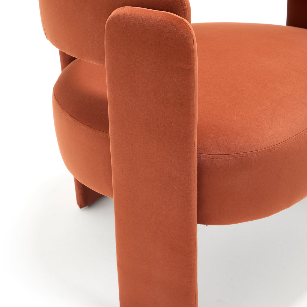 Close-up of an orange chair with a white background