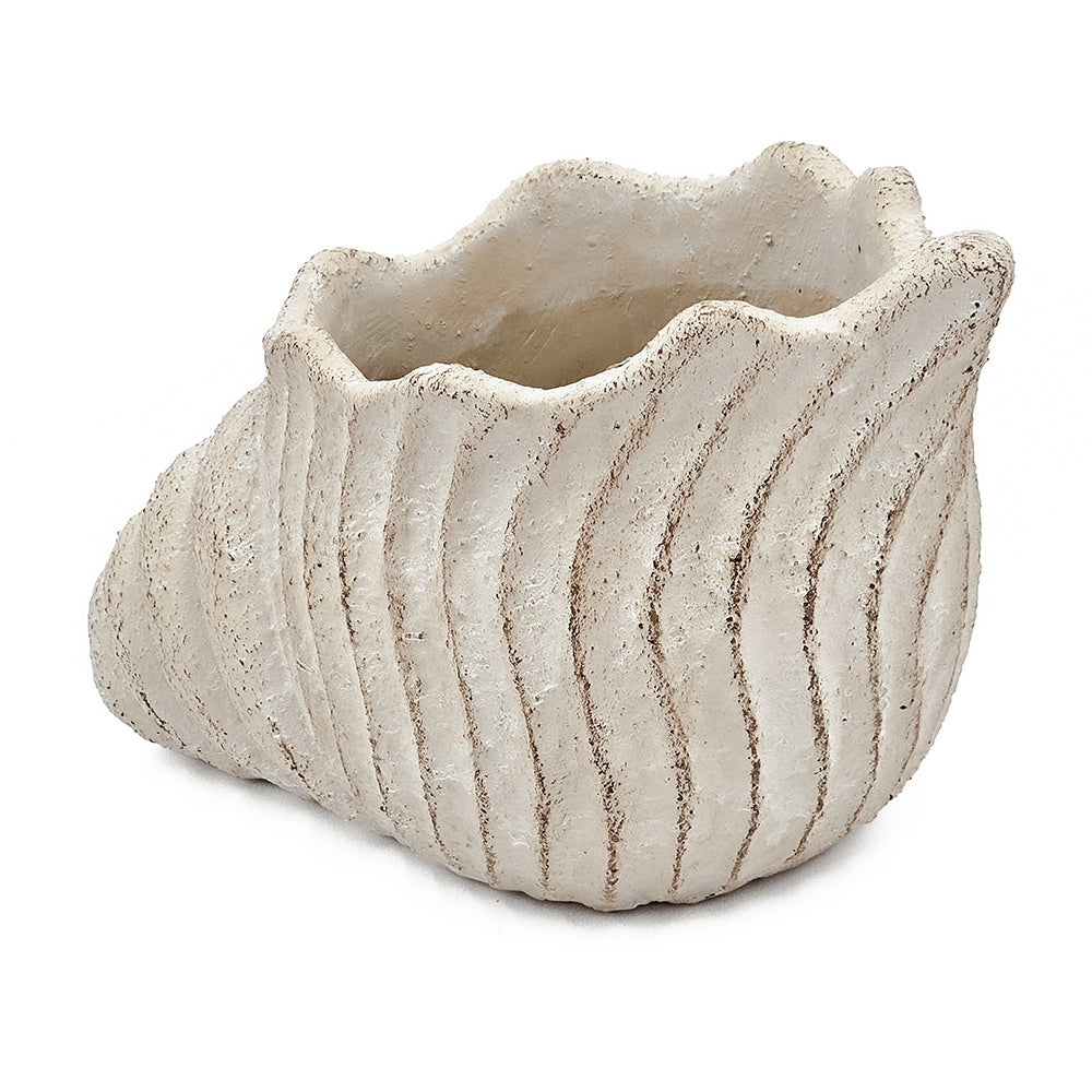 Textured ceramic planter on a white background