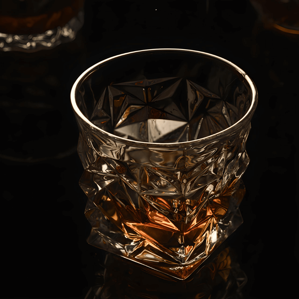 Crystal glass with textured design on a dark background