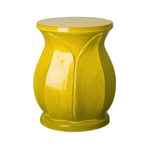 Yellow ceramic stool on a white background