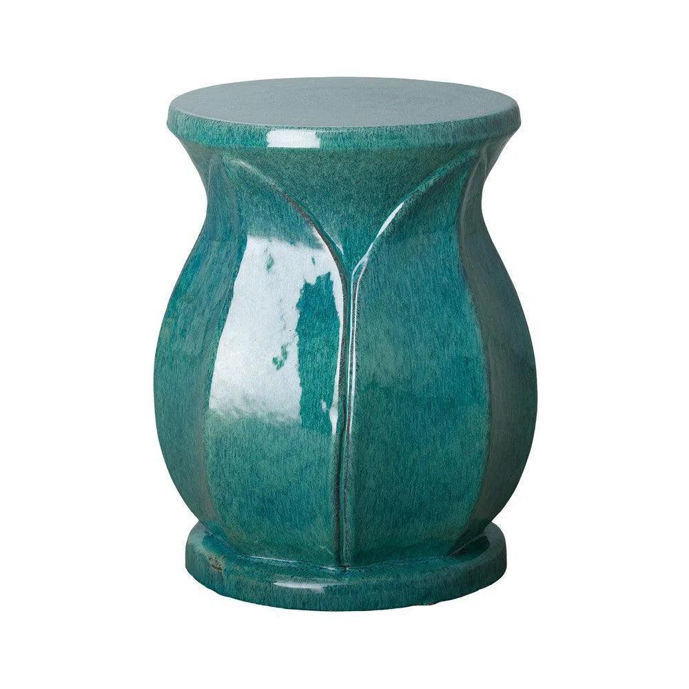 Teal ceramic stool on a white background