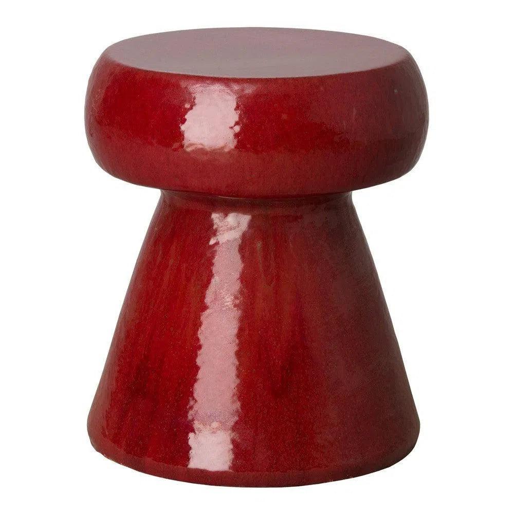 Red ceramic stool on a white background