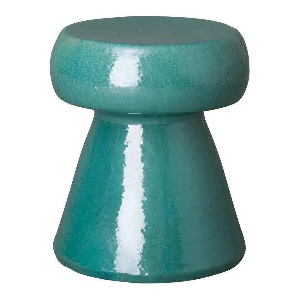 Teal ceramic stool on a white background