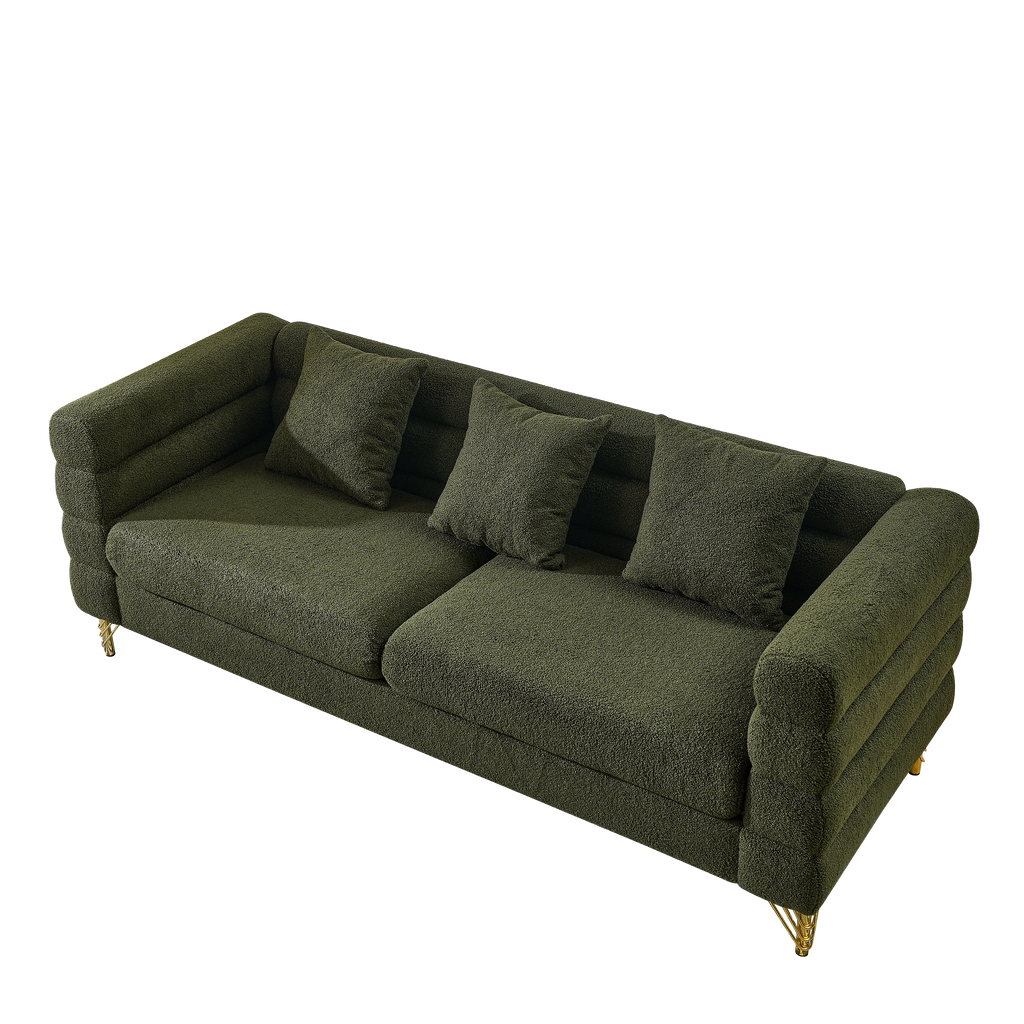 Green sofa with cushions on a white background