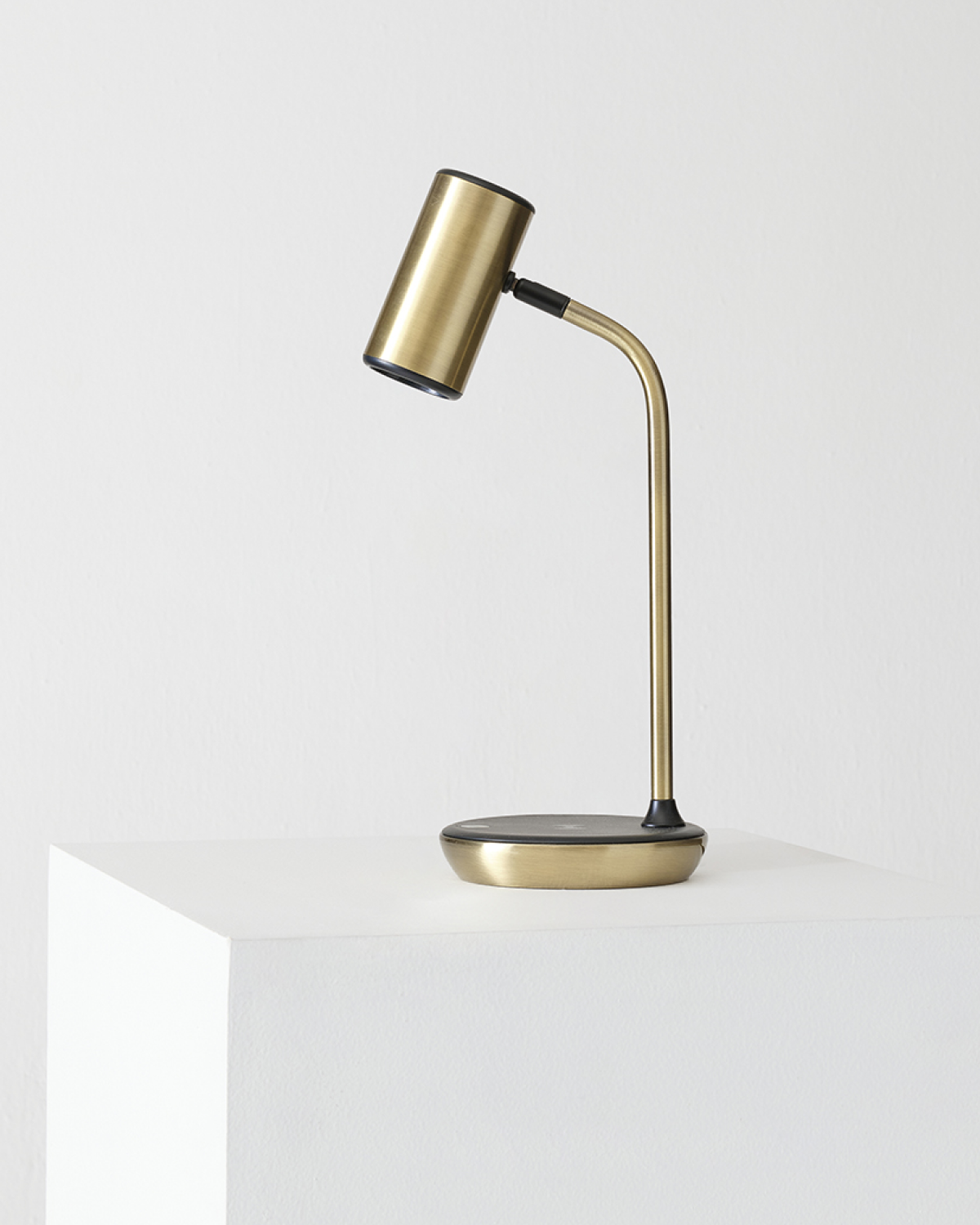 Gold desk lamp on a white background