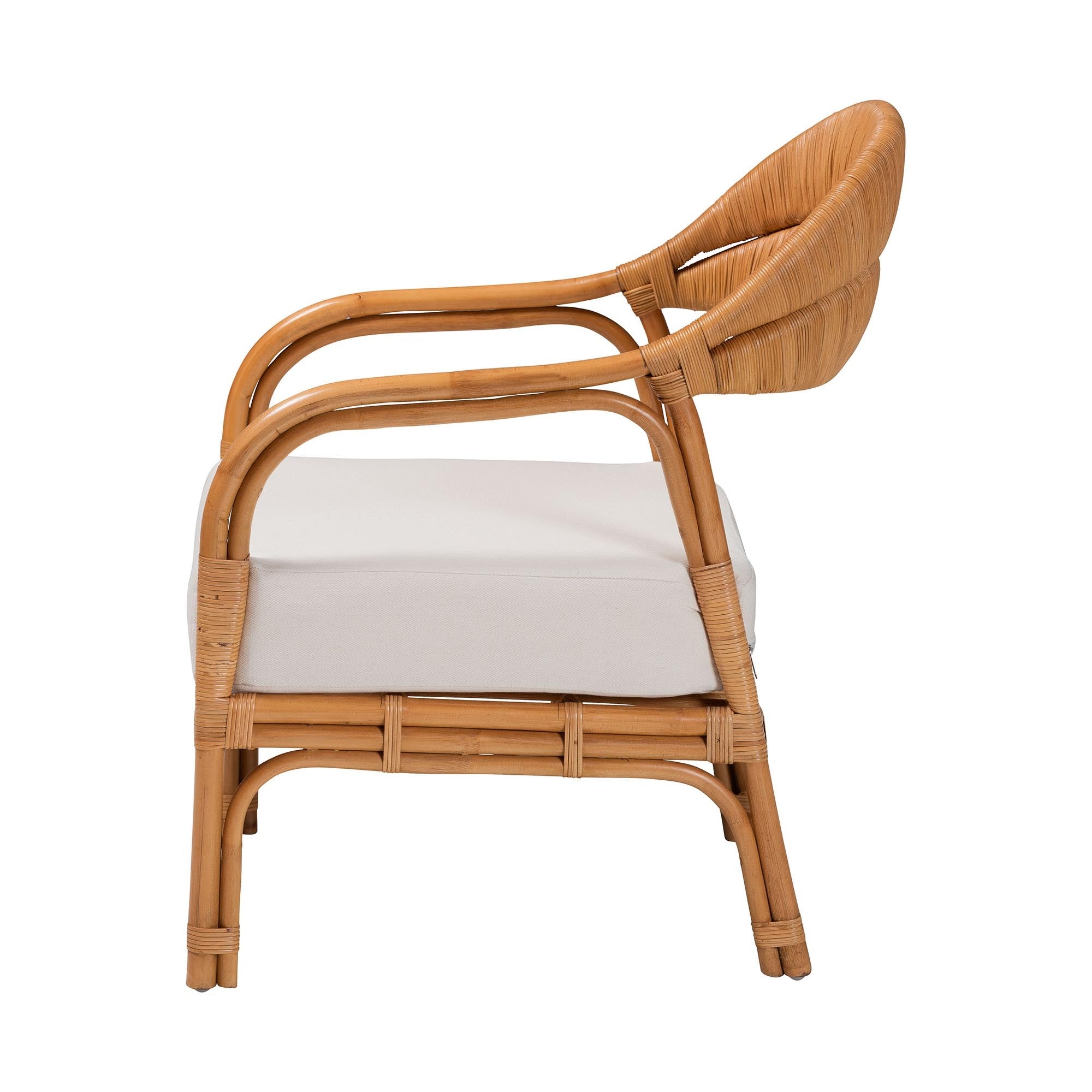 Wicker chair with a white cushion on a white background