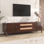 A modern dark brown wooden TV stand with two drawers featuring woven cane fronts, styled in a contemporary living room setting under a wall-mounted TV.