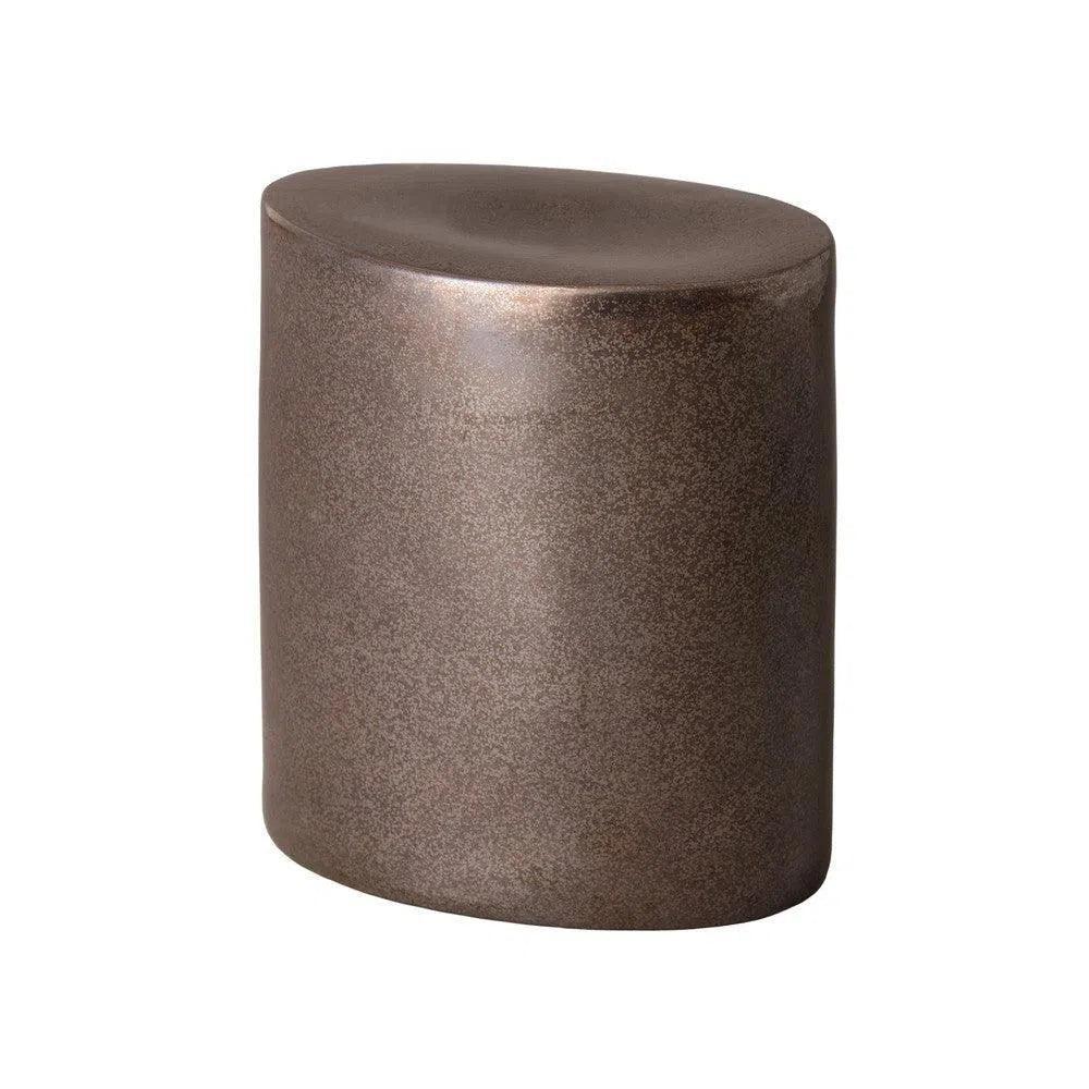 Bronze-colored cylindrical object on a white background