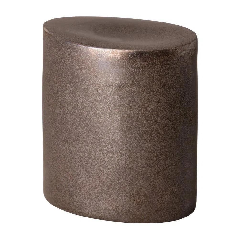 Bronze-colored cylindrical object on a white background