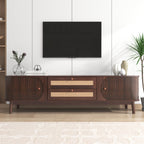 Wooden entertainment console with a television mounted above it in a living room setting.