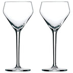 Two clear wine glasses on a white background