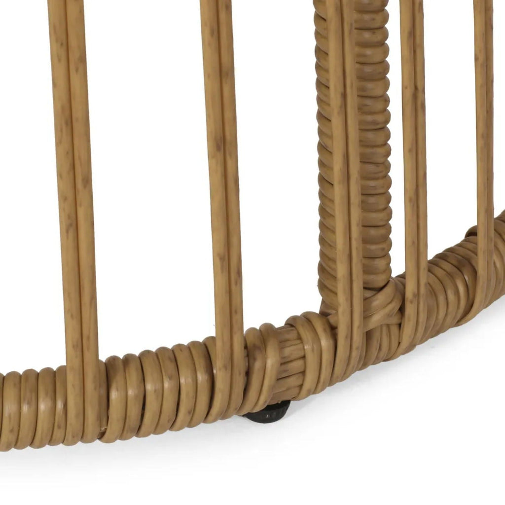 Close-up of a woven rattan chair on a white background