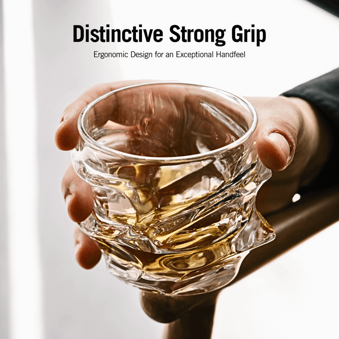 Glass mug with a distinctive strong grip design, held by a hand.