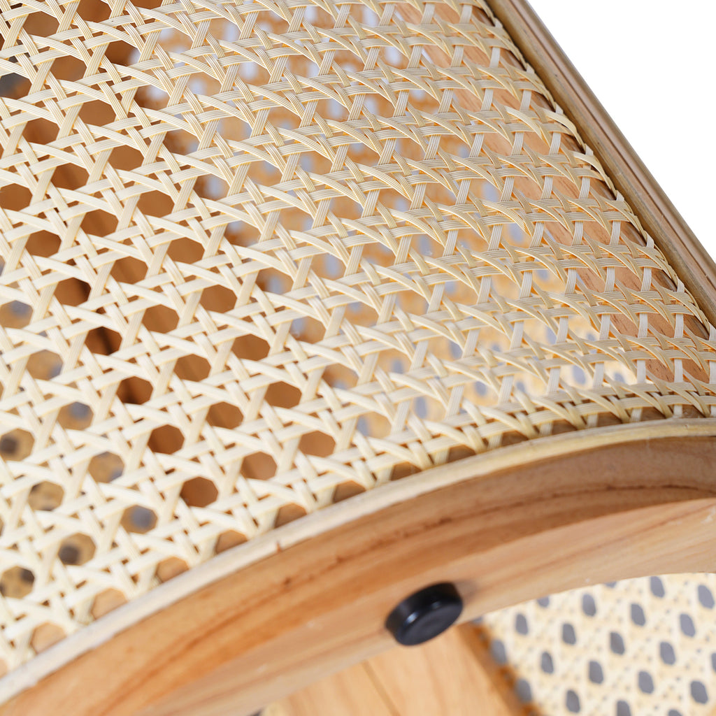 Close-up of a woven rattan surface with a wooden frame.