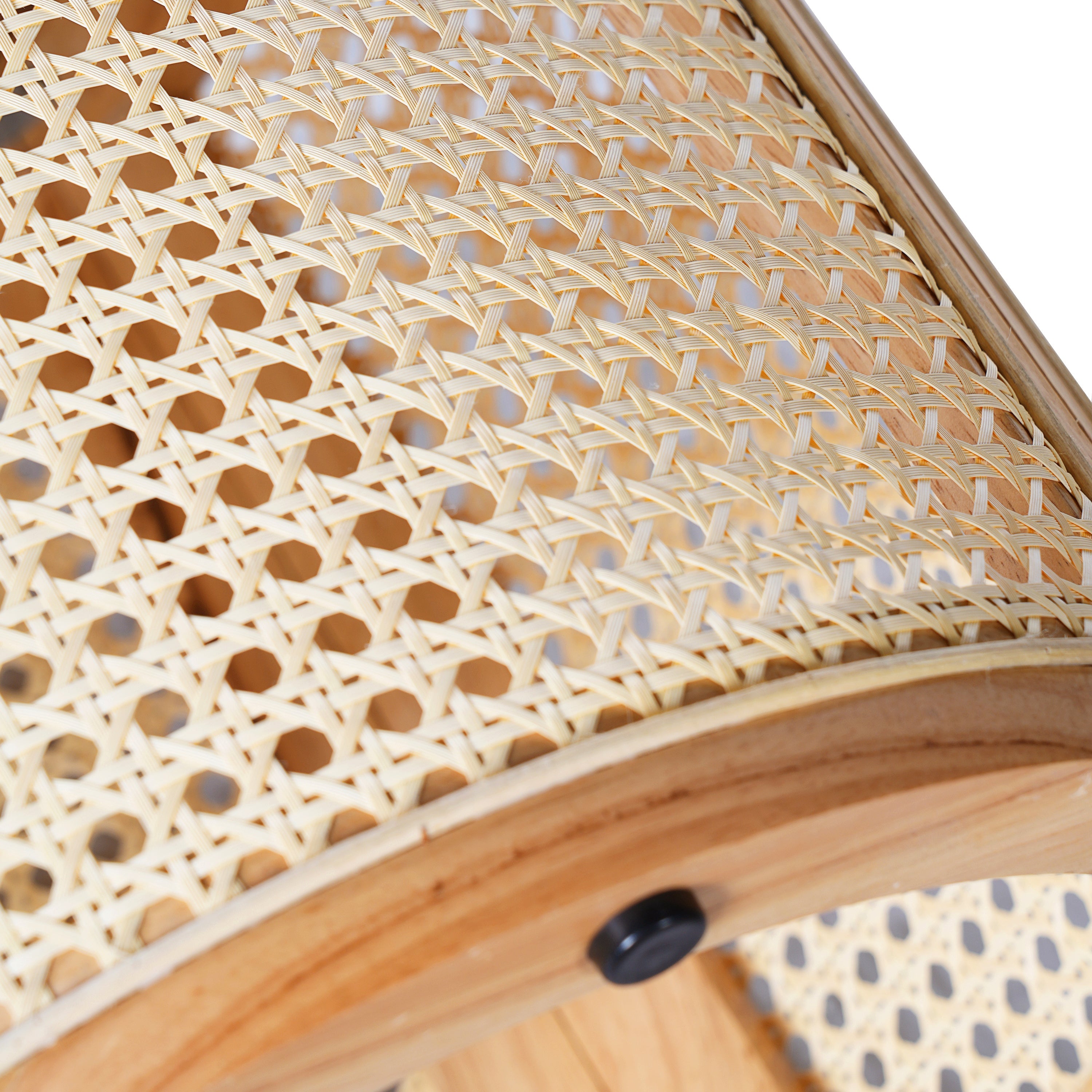 Close-up of a woven rattan surface with a wooden frame.