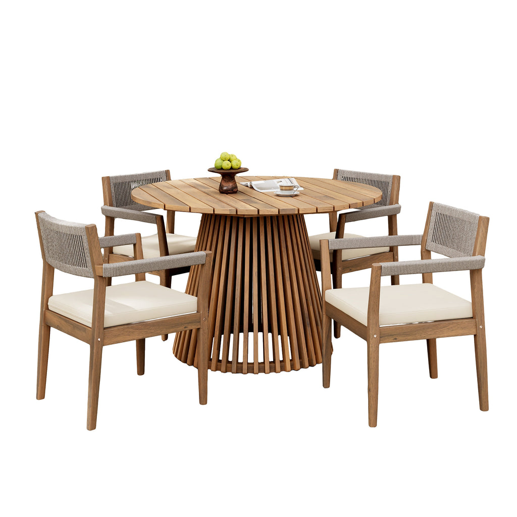 Wooden dining table with four matching chairs on a white background