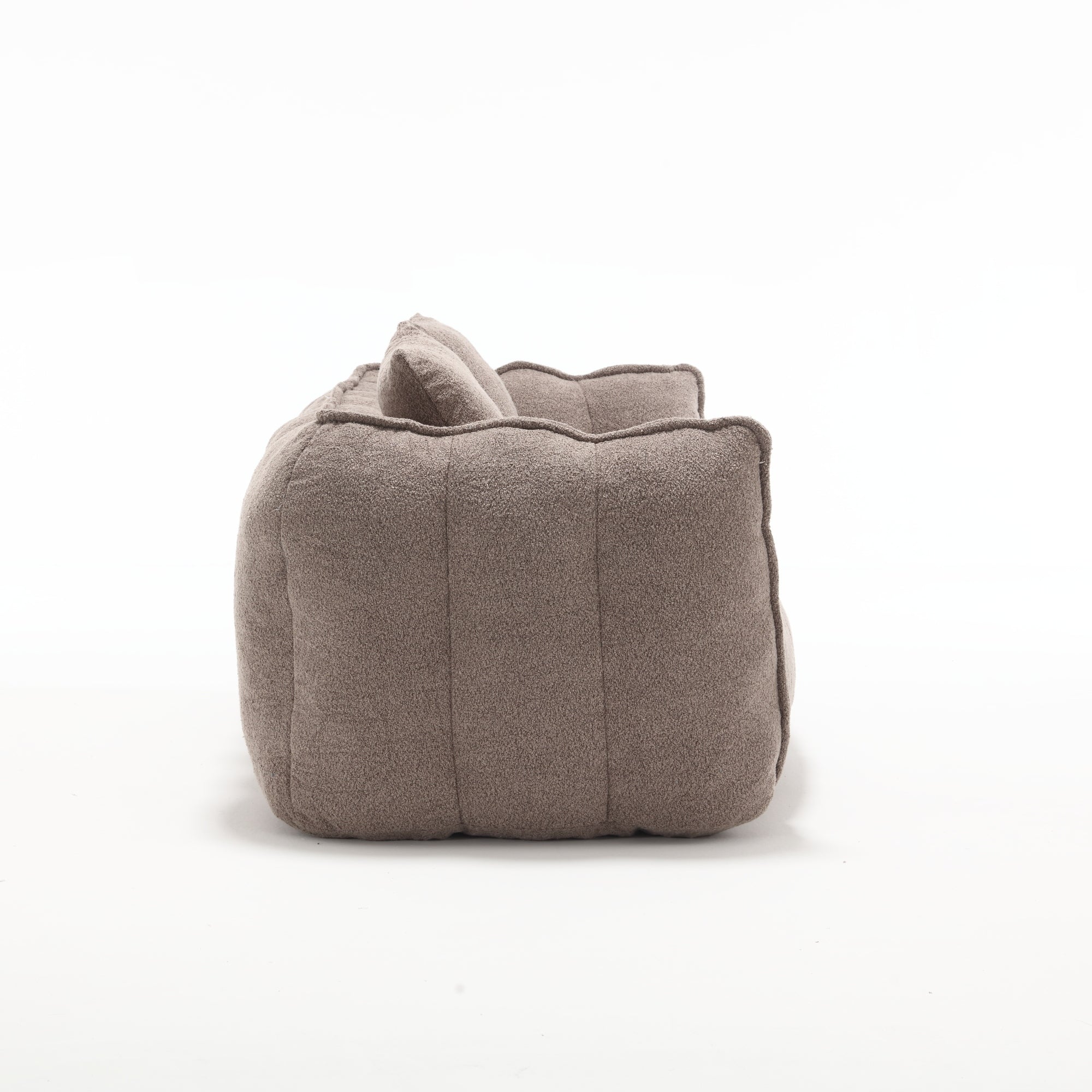 Brown fabric sofa side on a white background