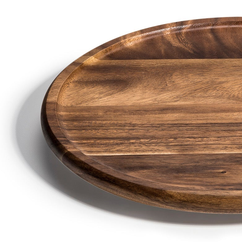 Wooden tray with a natural finish on a white background