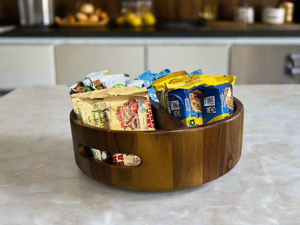 Wooden bowl with snacks on a kitchen counter