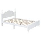 White wooden bed frame with slats on a white background