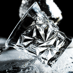 Close-up of a clear diamond on a dark background