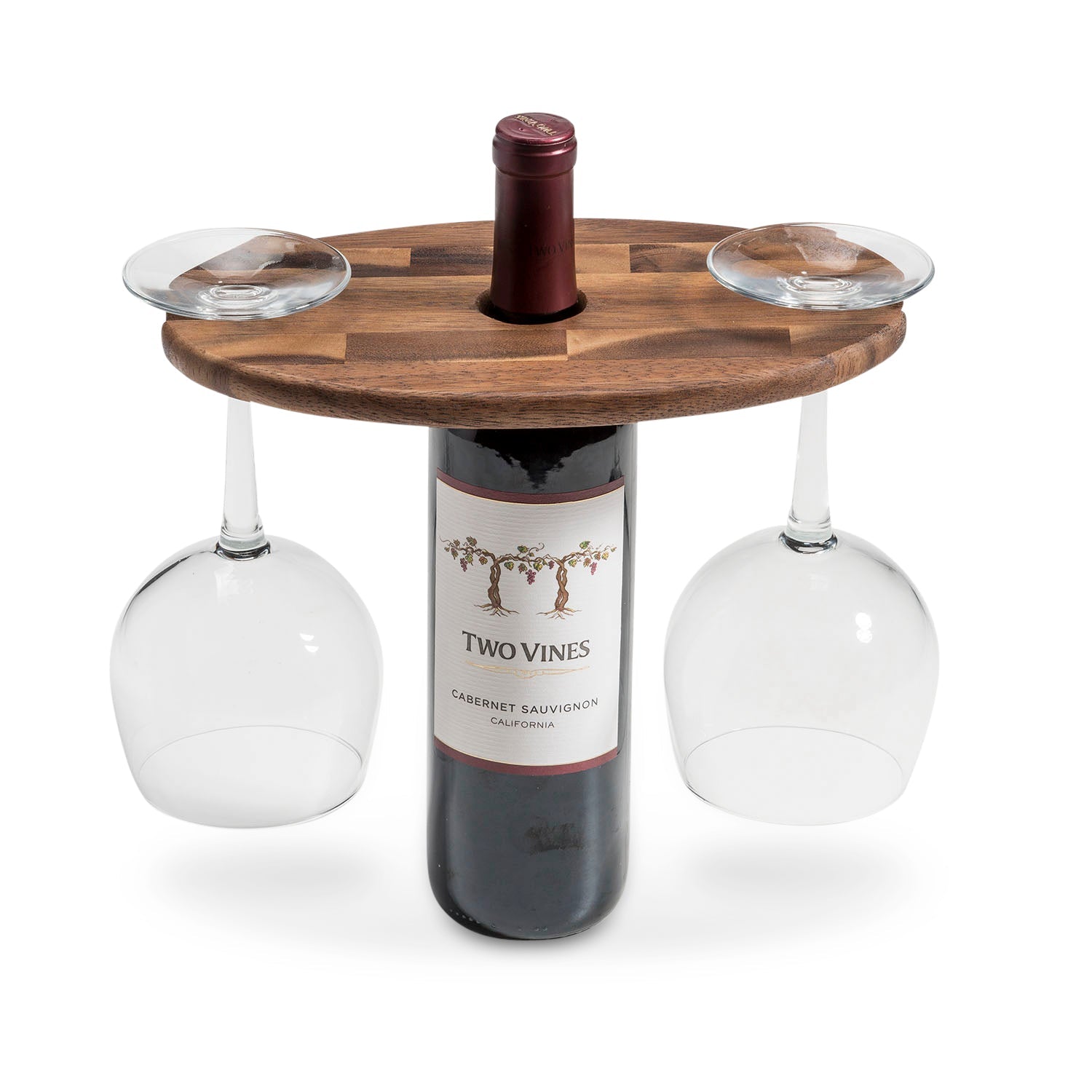 Wooden wine holder with two glasses and a bottle of 'Two Vines' wine on a white background