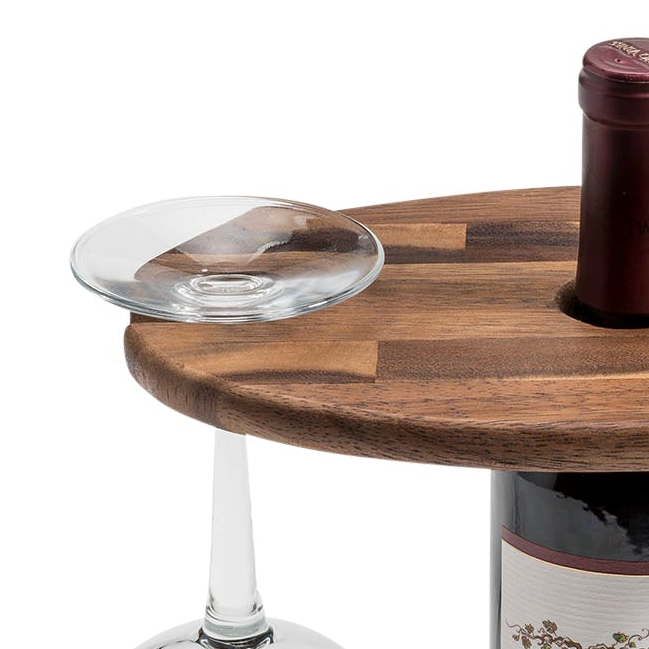 Wooden wine bottle holder with a bottle and glass on a white background