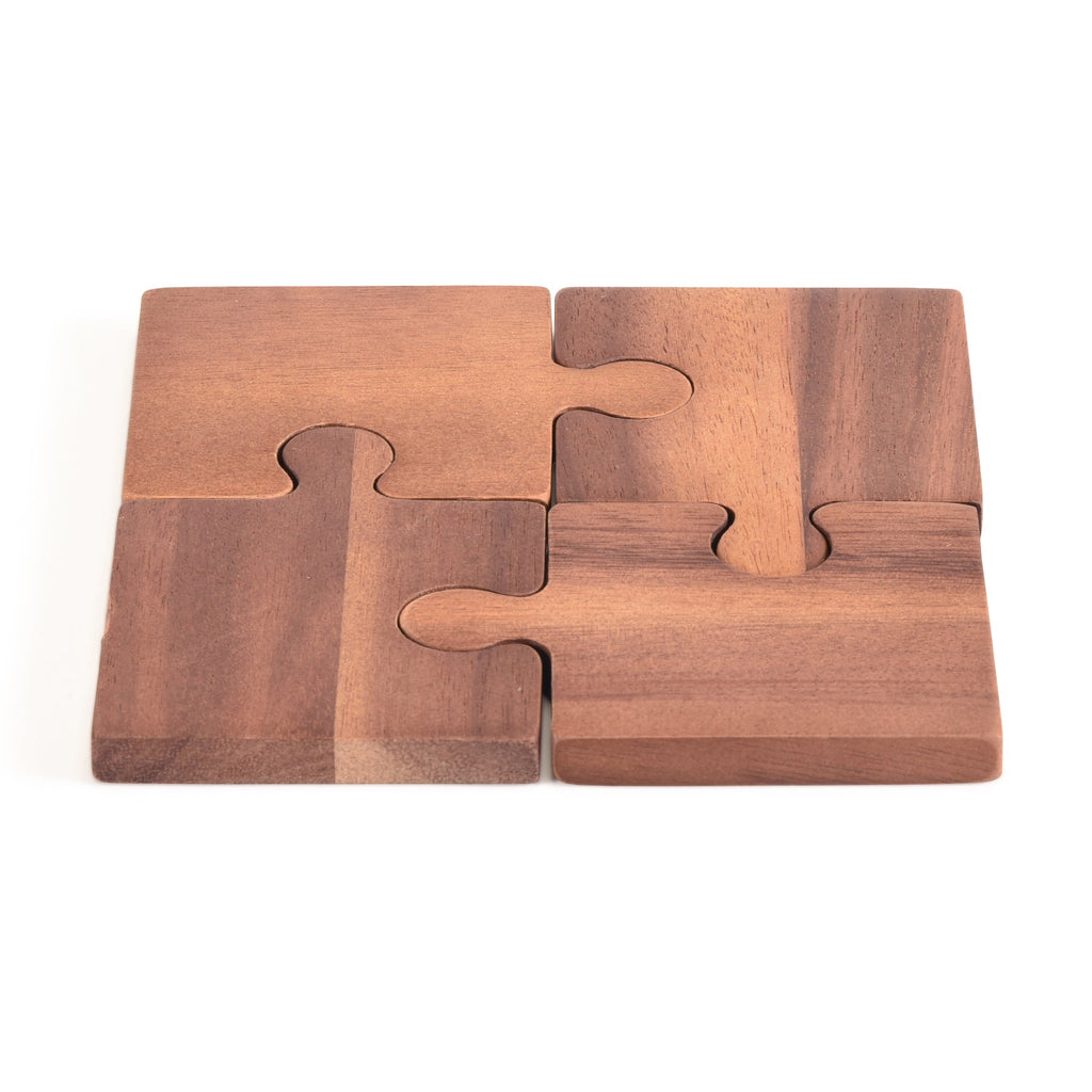 Wooden puzzle coasters cutout on a white background