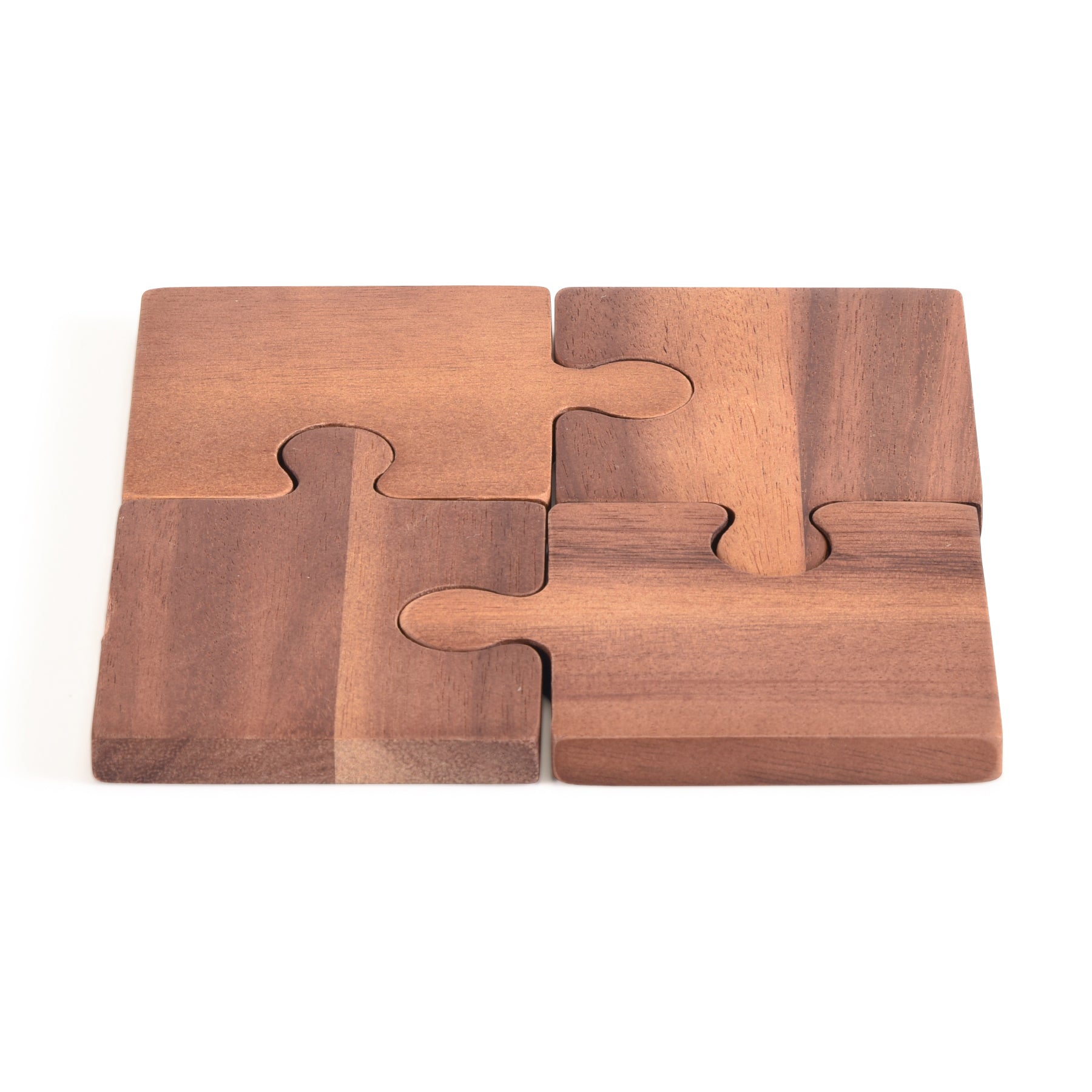 Wooden puzzle coasters cutout on a white background