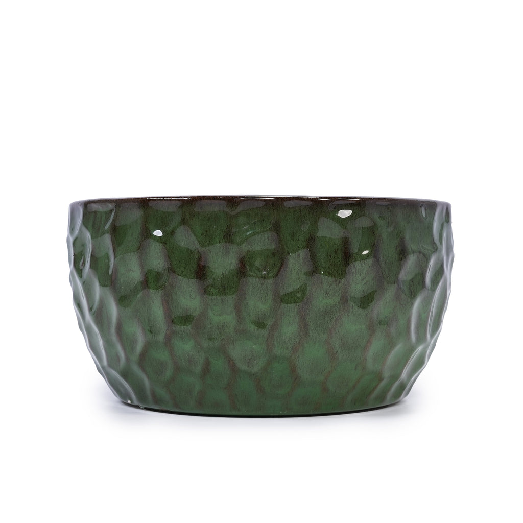 Green textured ceramic planter on a white background
