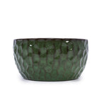 Green textured ceramic planter on a white background