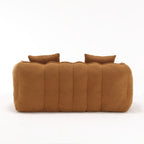 Brown cushioned sofa back on a white background