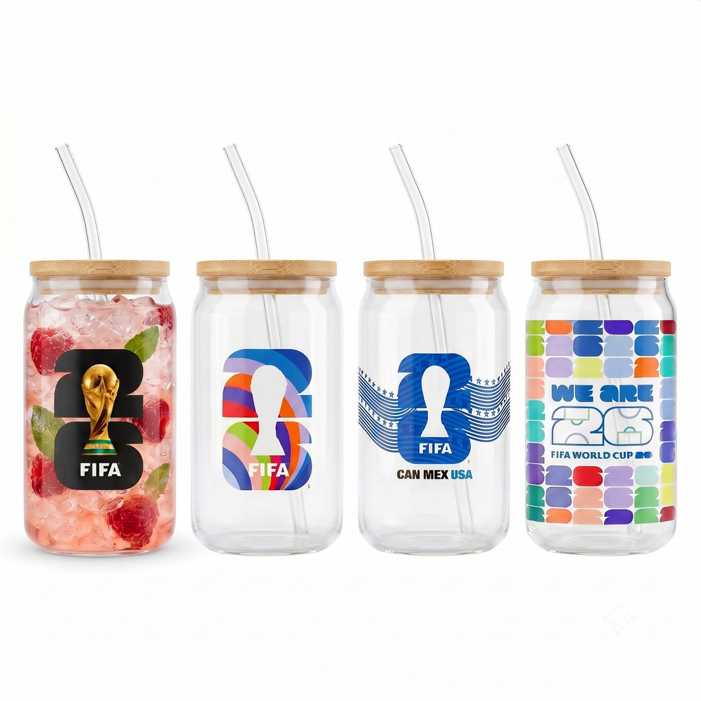 Four glass jars with lids and straws featuring FIFA World Cup branding on a white background.