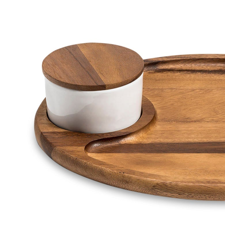 Wooden tray with a white container and wooden lid on a white background