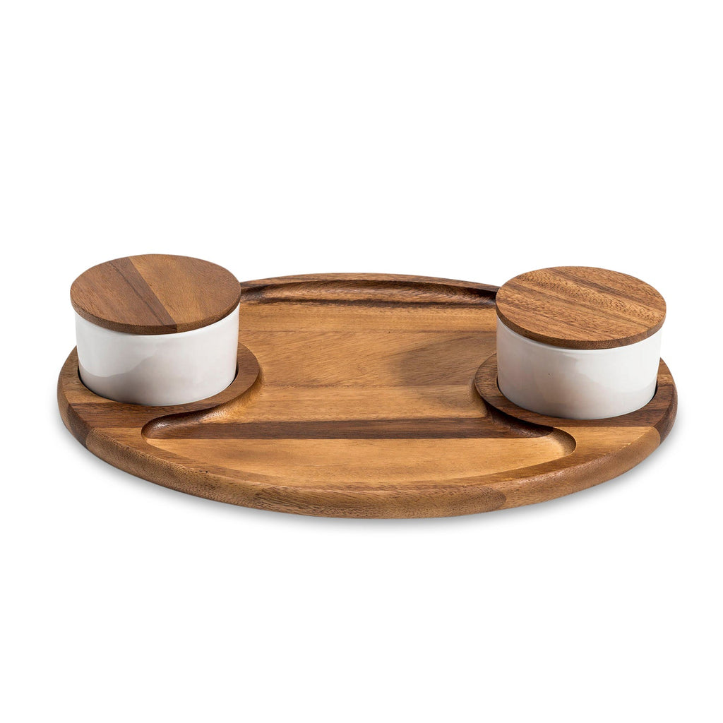 Wooden tray with two white containers and wooden lids on a white background