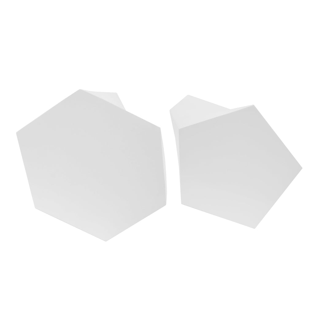 Two white polygonal tabletops on a white background