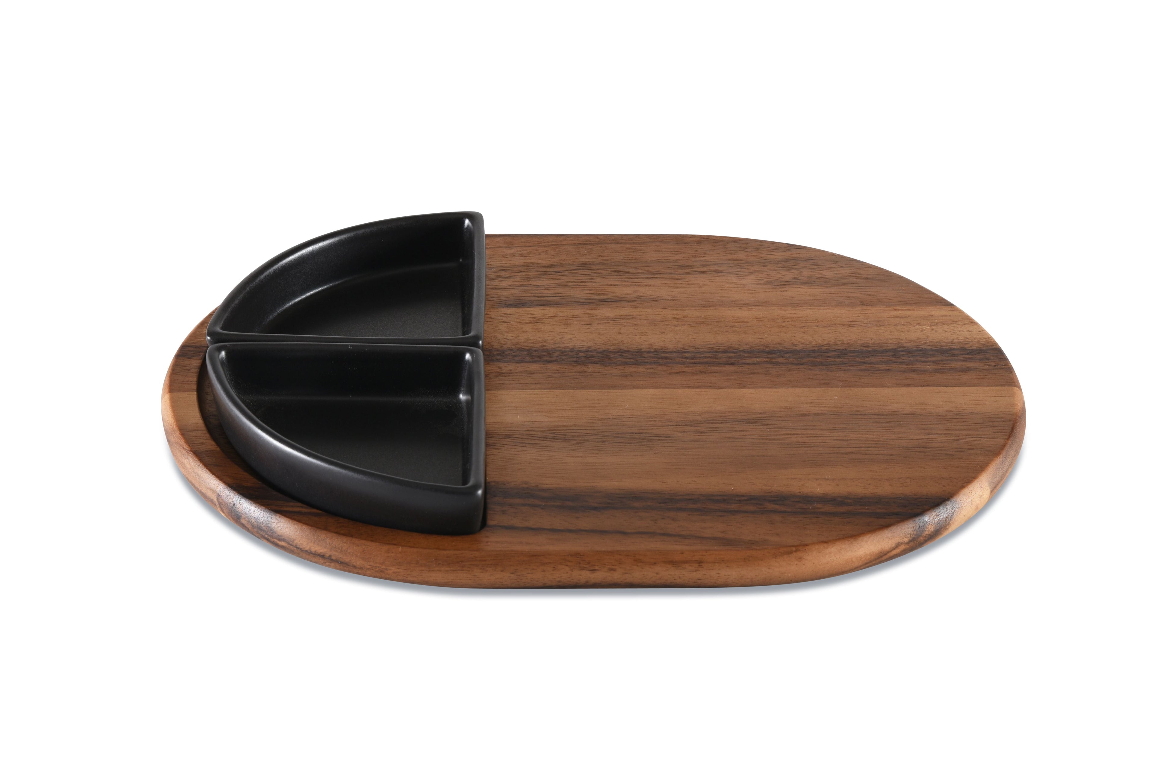 Wooden cutting board with black divided plate on a white background